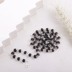 Karungali Malai ebony wood bead mala, flat lay arrangement