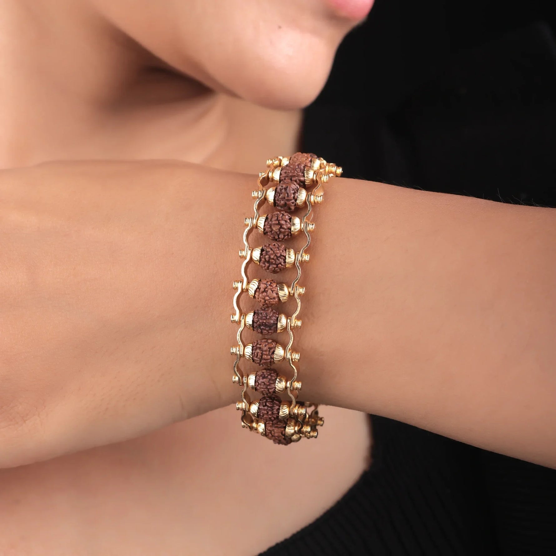 Unisex gold plated Rudraksha bracelet worn by model