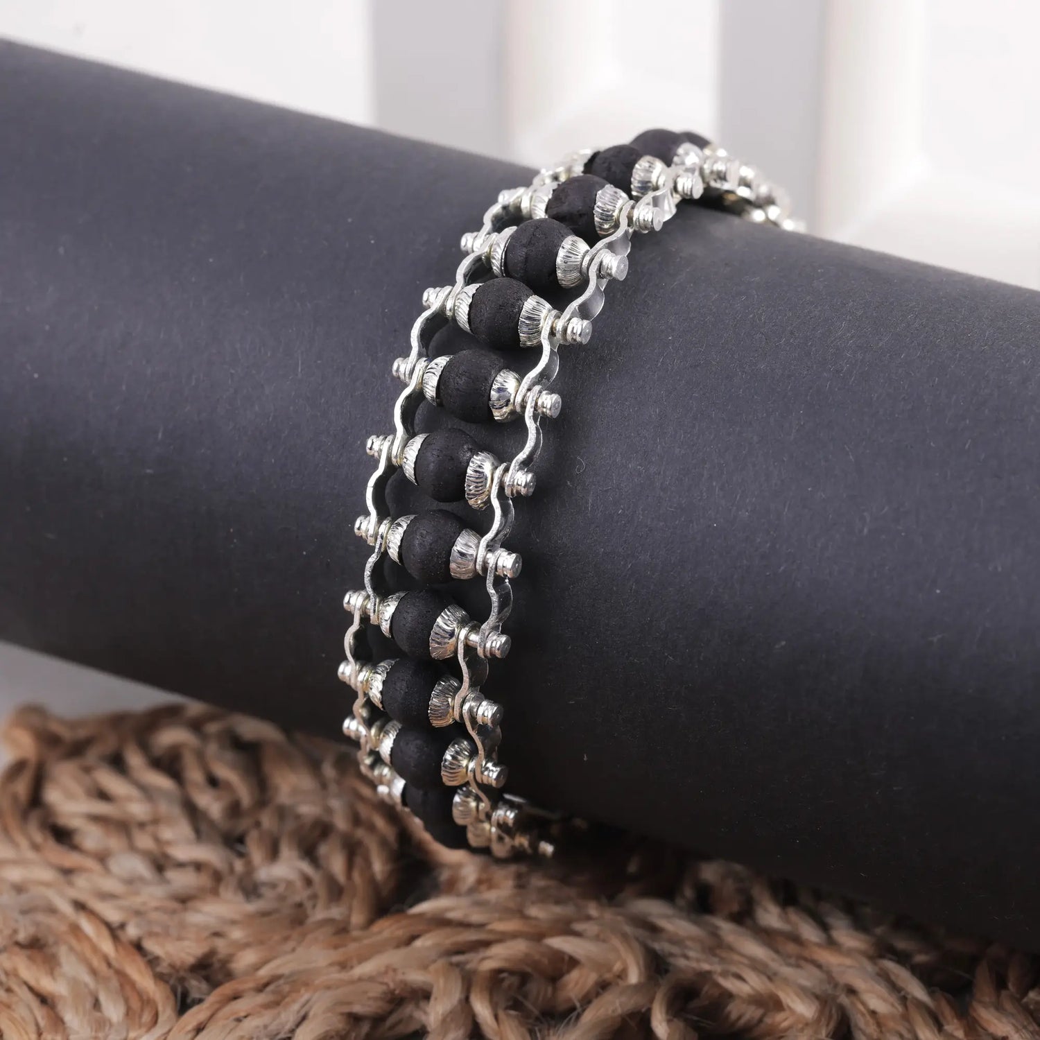 Silver-plated Karungali bracelet, natural ebony wood bead close-up