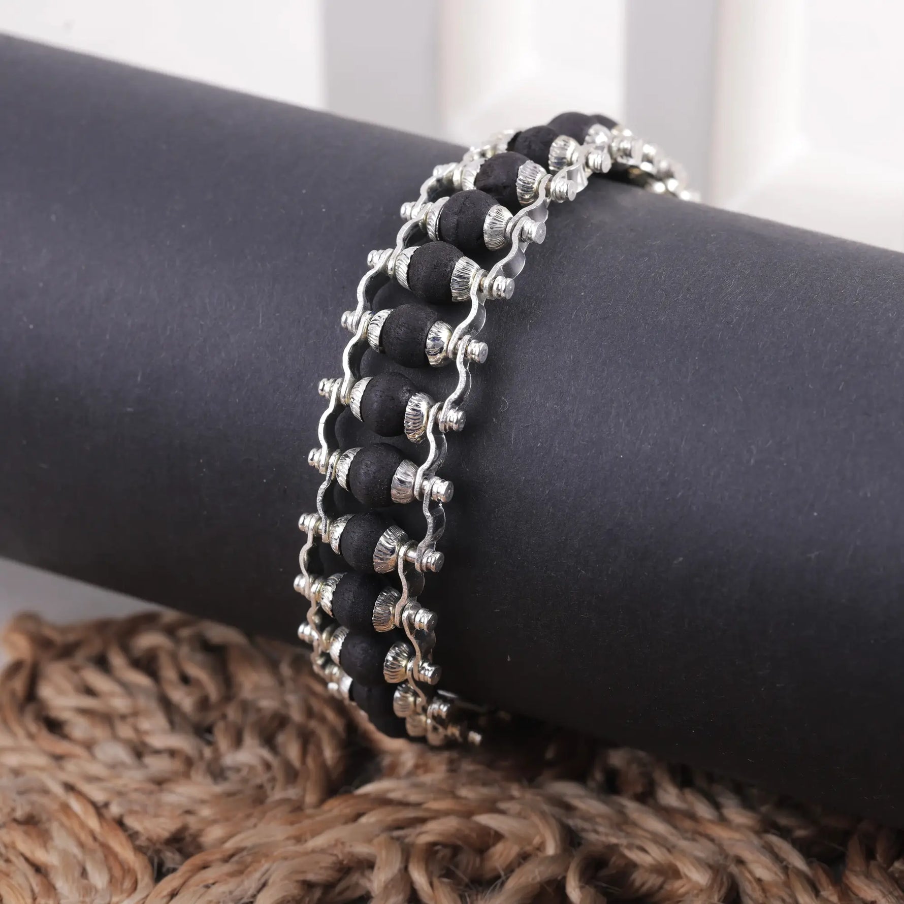 Silver-plated Karungali bracelet, natural ebony wood bead close-up