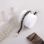 Karungali ebony wood silver chain bracelet flat lay, Divymukhi