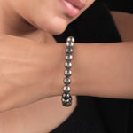 Unisex Pyrite stone bead bracelet worn by model